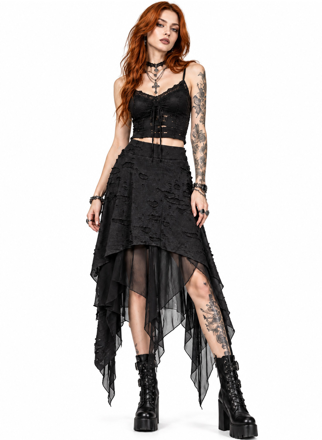 Apocalypse Chic Skirt, svart gotisk asymmetrisk kjol med strukturerat, slitet tyg, transparenta meshlager, spetsiga fållar och elastisk midja.